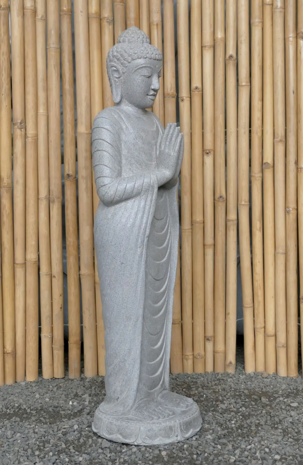  Product image 2 of the product “Standing Buddha made of Riverstone, position Namaskara , H. 122cm. ”